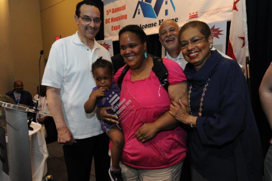 House Lottery winner Christina Brown with Mayor Gray and Congresswoman Holmes Norton